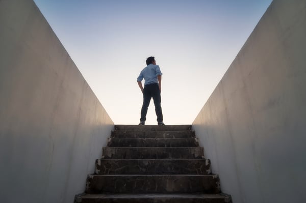 Man looking out of staircase