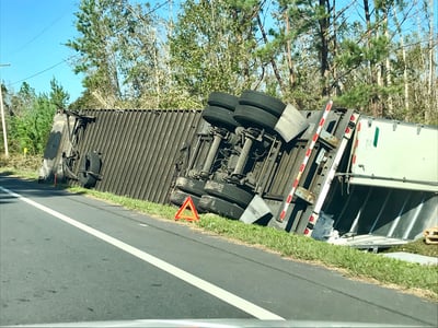 Truck blown off road in hurricane